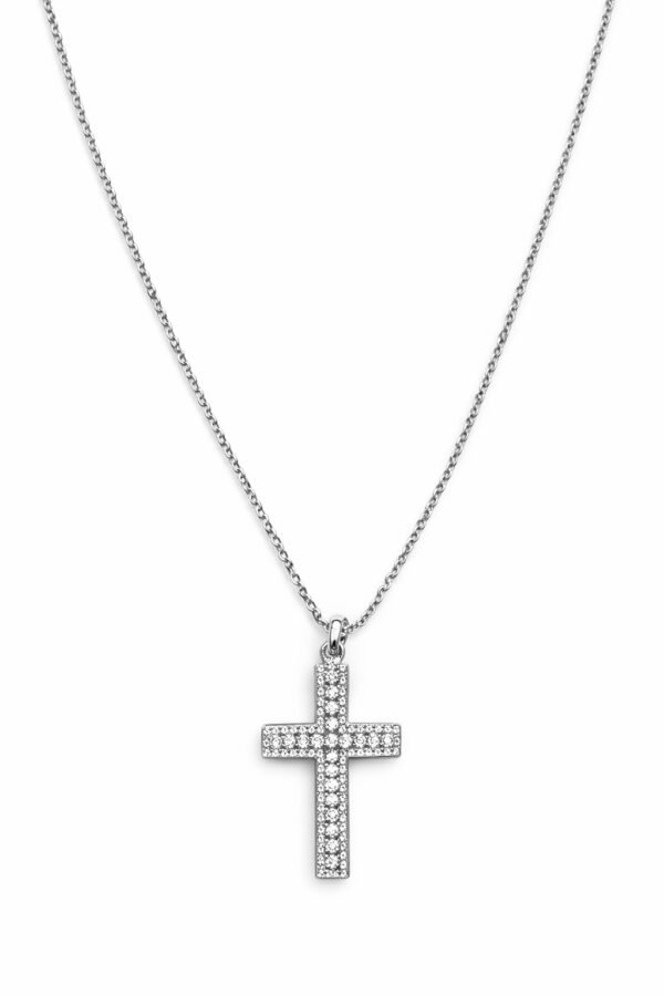 Ασημί κολιέ με σταυρό διακοσμημένο με λαμπερές πέτρες ζιργκόν. Κομψό και διαχρονικό, ιδανικό για κάθε περίσταση.