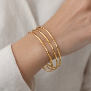 0-02-05-64663590d9d2d6bc5df8dbaf0398d21d250882ded42b33c7c4f196ed0179ce7b_12e0c5008f835aaa Ατσάλινες βέργες σε χρυσή απόχρωση.