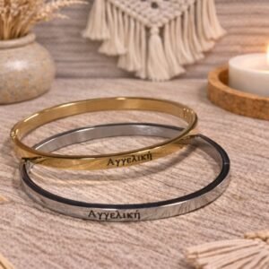 0-02-05-b4d0a10ace99c084c22d6fccdb99b12eee01b2f941846cf566e765fad8704b73_c38c423ead419d7b Ατσάλινη χειροπέδα σε κομψή ασημί απόχρωση, με το όνομα ΑΓΓΕΛΙΚΗ.