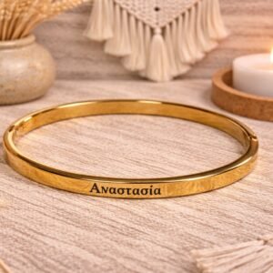 0-02-05-f8816055850abd1d93ea37f19c6c89a8f6dcec95e6083b09bc53dee91328af7c_44f2ccd4d2e4d793 Ατσάλινη χειροπέδα σε χρυσή απόχρωση με χαραγμένο το όνομα ΑΝΑΣΤΑΣΙΑ.