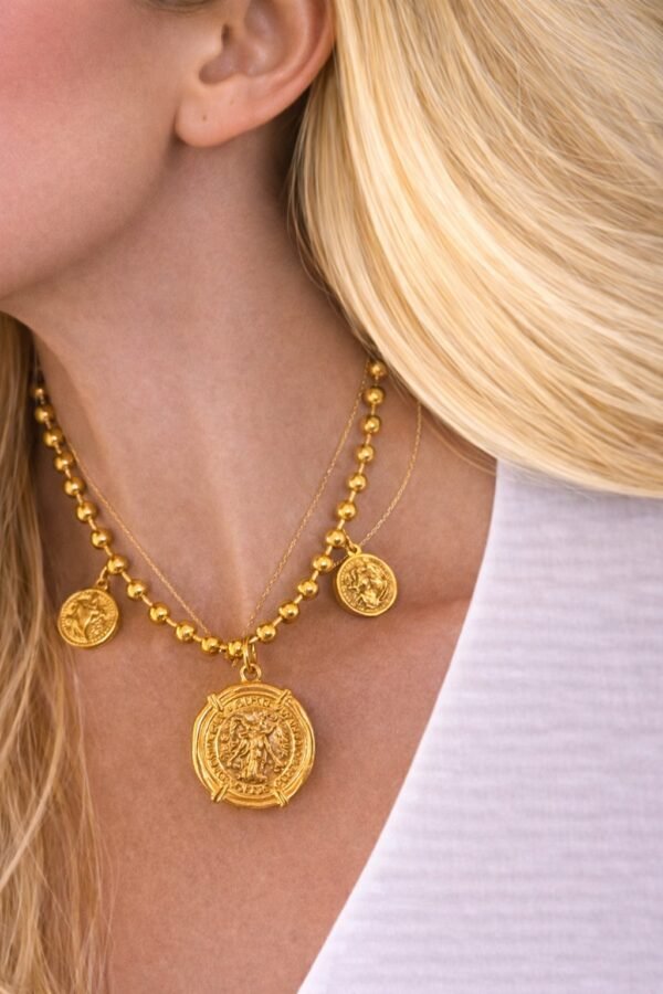 Εντυπωσιακά μεταλλικά μοτίφ τύπου νομίσματος.