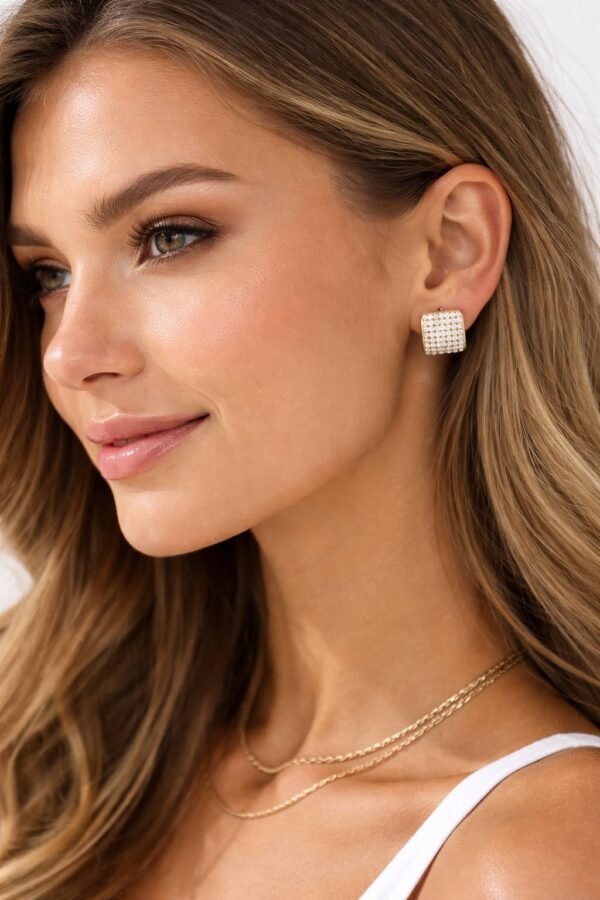 Σκουλαρίκια σε χρυσή απόχρωση.