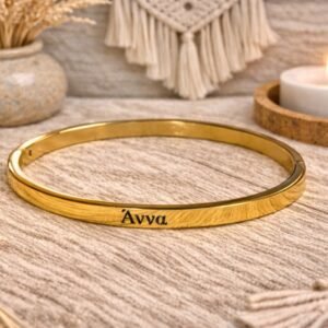 viber_image_2026-02-05_17-13-25-166 Ατσάλινη χειροπέδα σε χρυσή απόχρωση με χαραγμένο το όνομα ΑΝΝΑ.